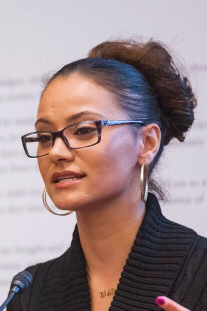 Close-up portrait of T Ortiz speaking at a panel